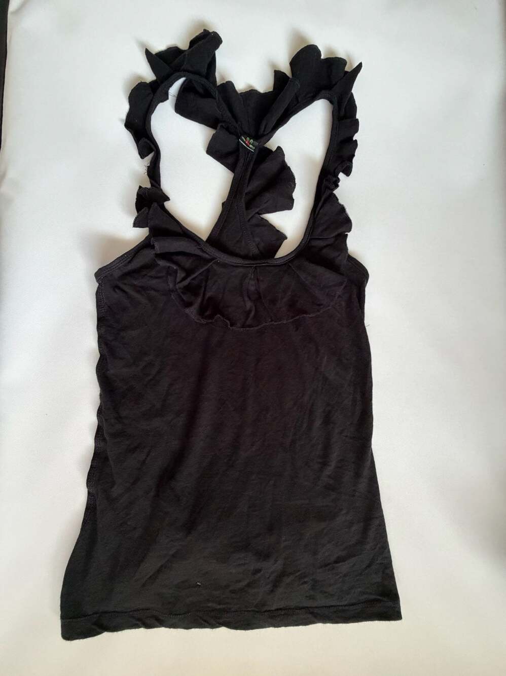 Moon River Women's Black Sleeveless Ruffle Trim Tank Top